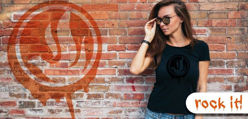 A model adjusts her sunglasses while wearing The Spirit Outfitters gear